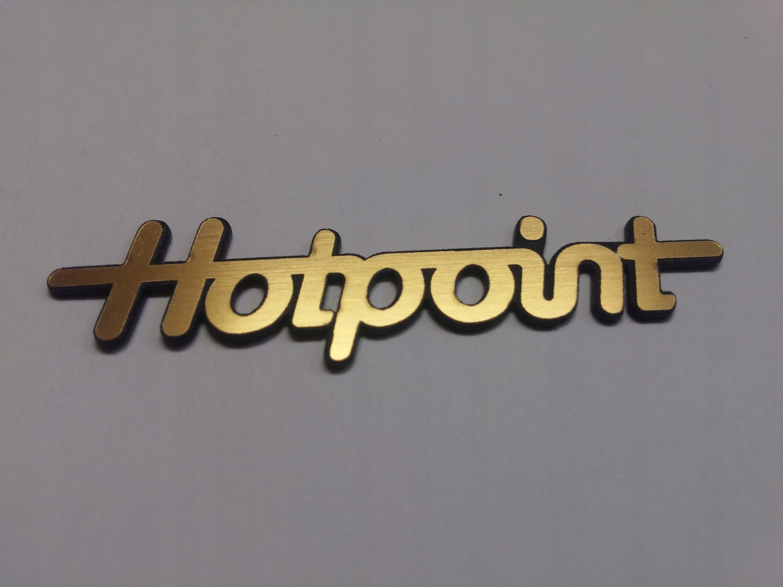 

Hotpoint naklejka emblemat 64 x 14 mm * Złota