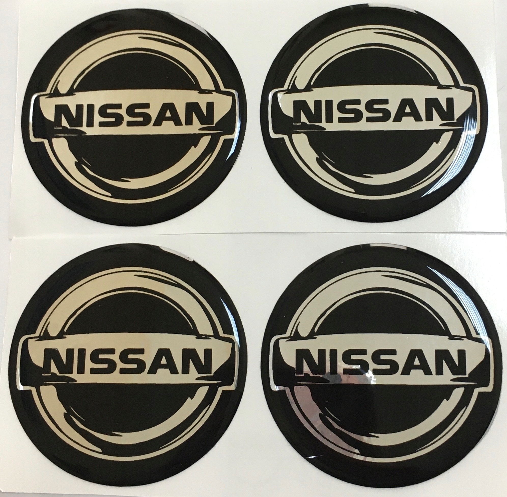 

Emblematy Na Kołpaki Felgi 56mm Nissan (zamiennik)
