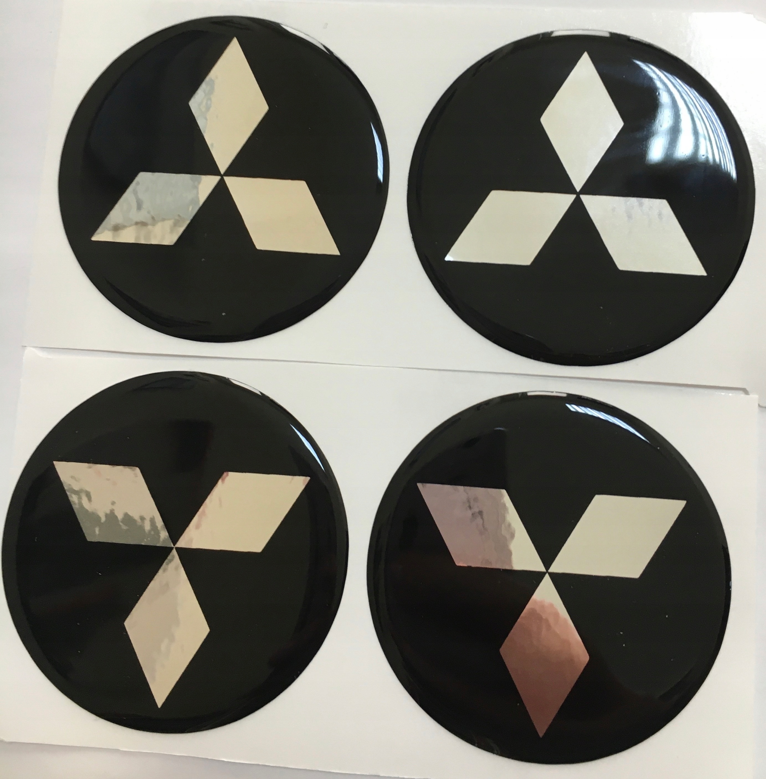 

Emblematy Na Kołpaki 56mm Mitsubishi (zamiennik)