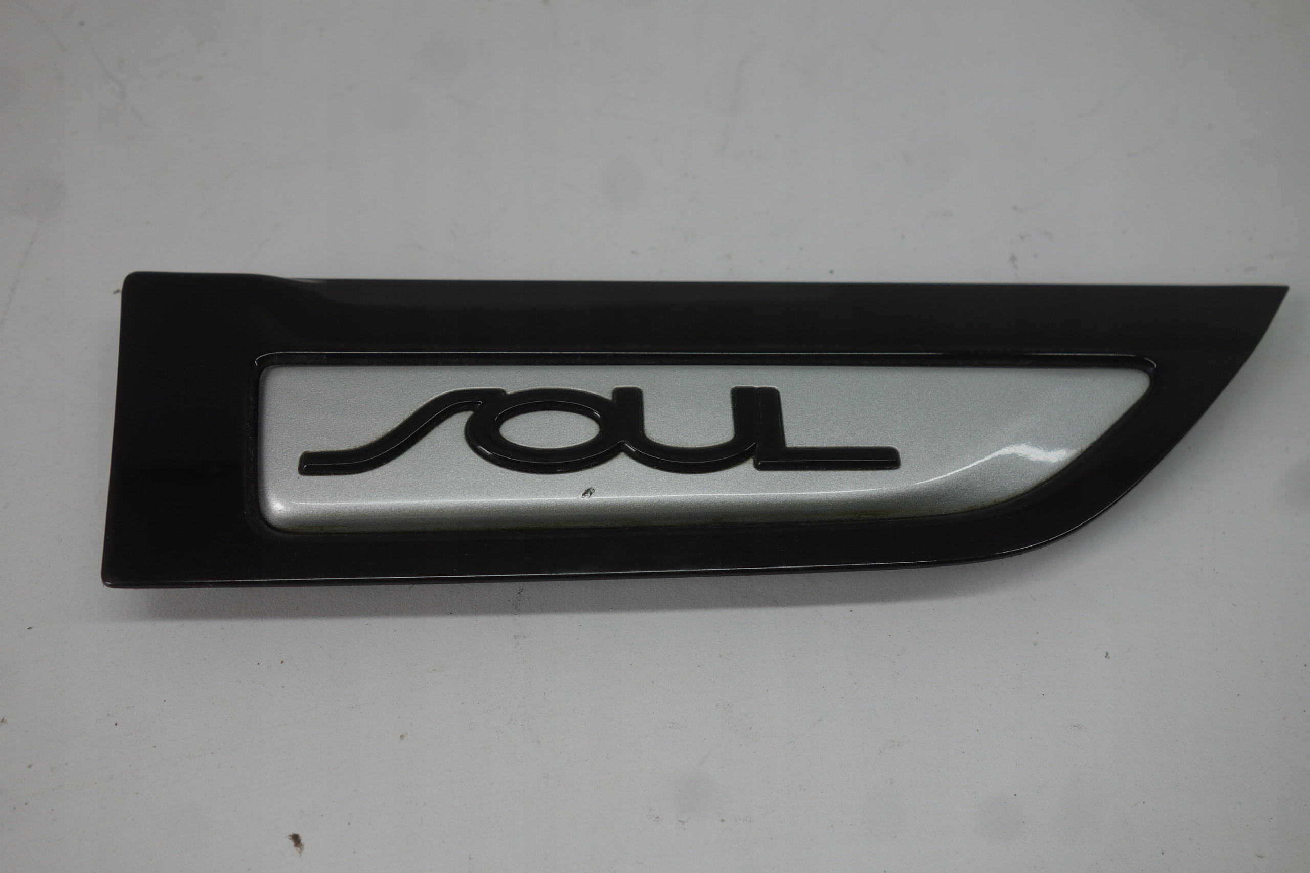 EMBLEMAT BŁOTNIKA PRZÓD PRAWY KIA SOUL II 2014- 87774-B2100