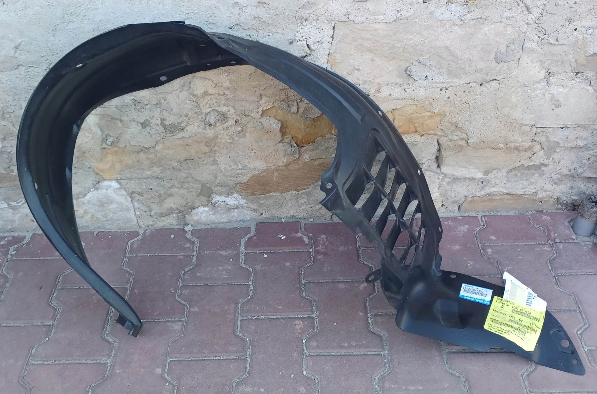 NADKOLE LEWY PRZÓD OE MAZDA MPV LD62-56-140G