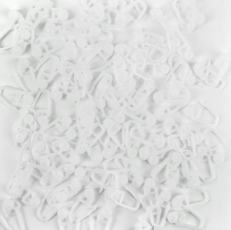 AGRAFKA PLASTIK Z ROLKĄ DO SZYNY PCV BIAŁA 100 SZT Marka Adgo