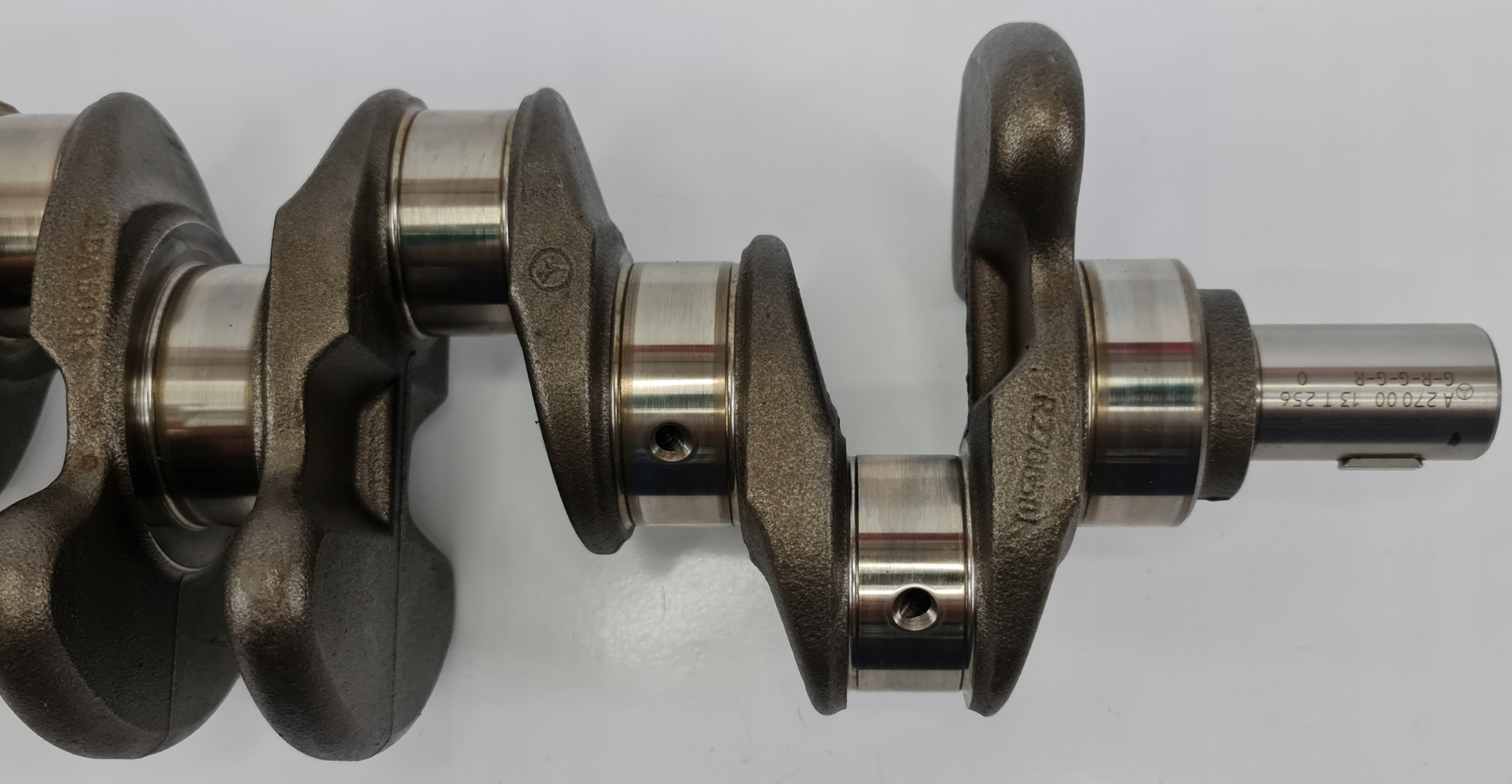 WAŁ KORBOWY MERCEDES W176 1.6 CGI 270910 A2700013 Producent części Mercedes-Benz OE