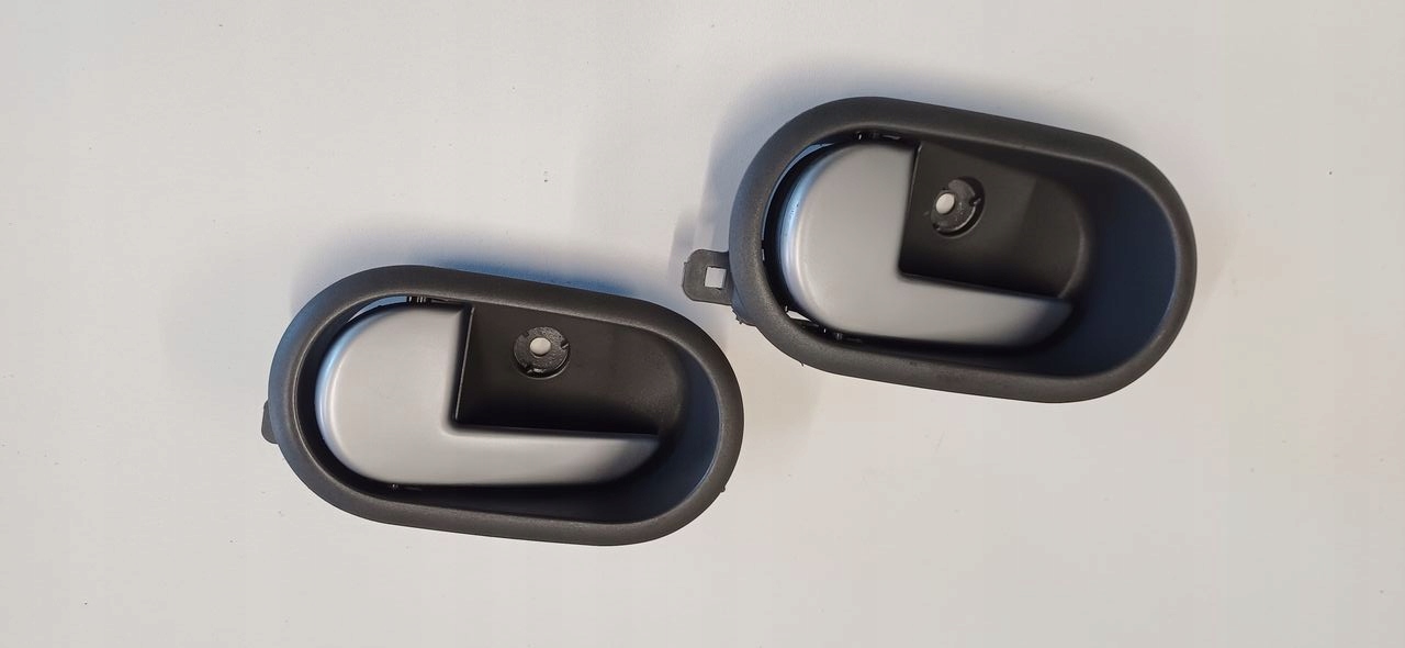 FORD FIESTA MK6 02-08 KLAMKA WEWNETRZNA LEWA PRZOD SREBRNA