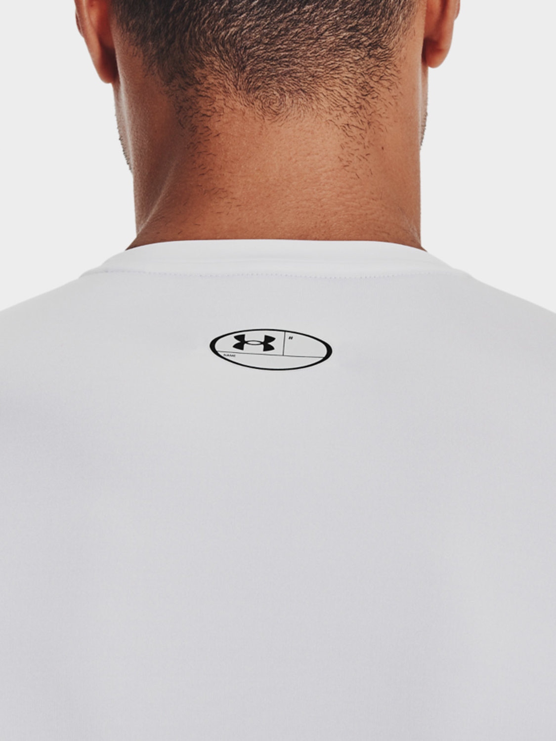 KOSZULKA MĘSKA UNDER ARMOUR LONGSLEEVE TERMOAKTYWNA SZYBKOSCHNĄCA 1361524 Kolor biały