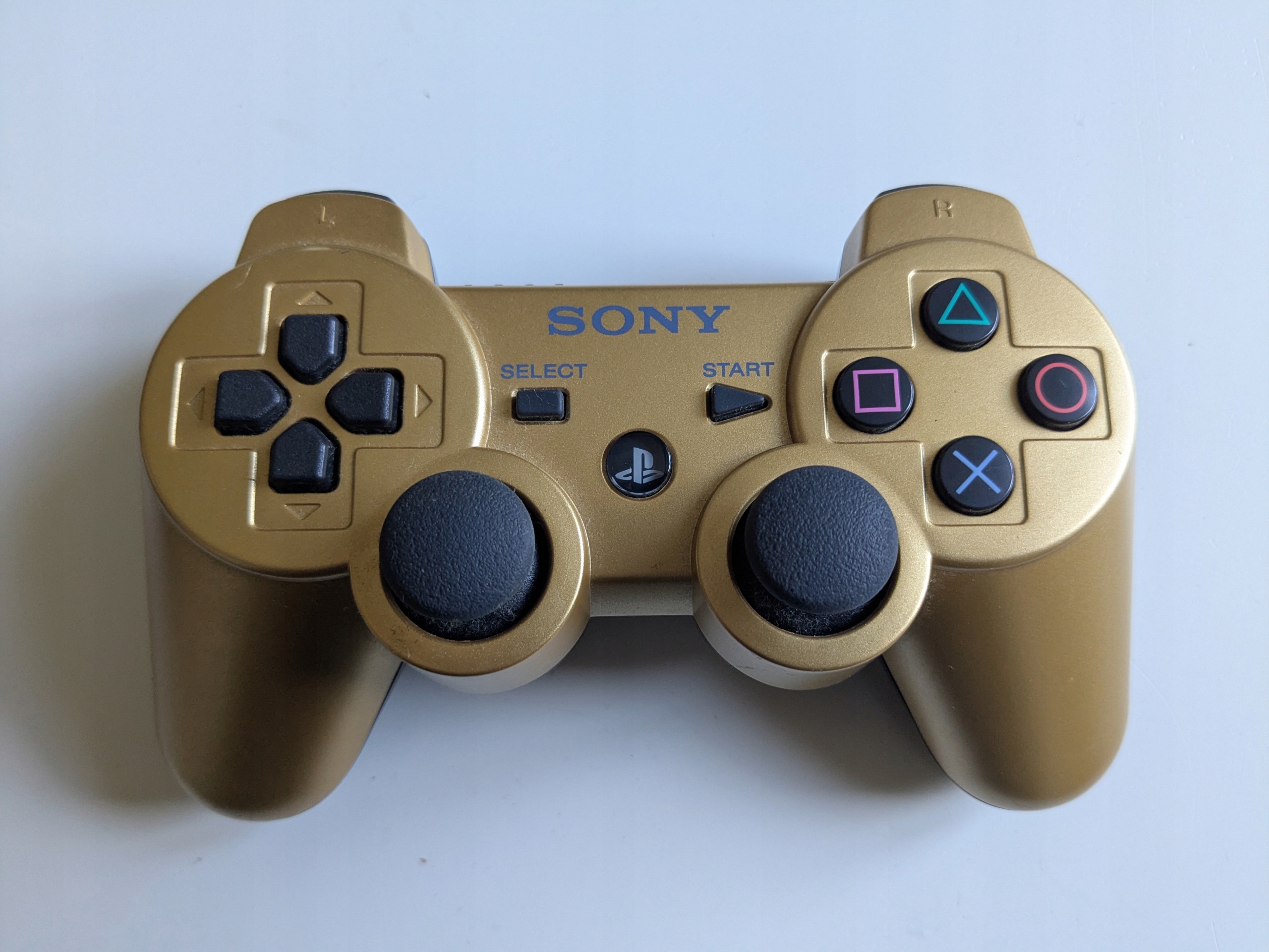 Pad bezprzewodowy, przewodowy Sony złoty