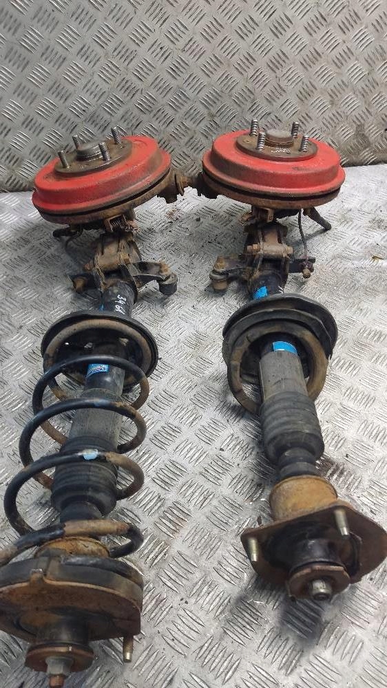 shock absorber swing left right rear part MAZDA 323F BA