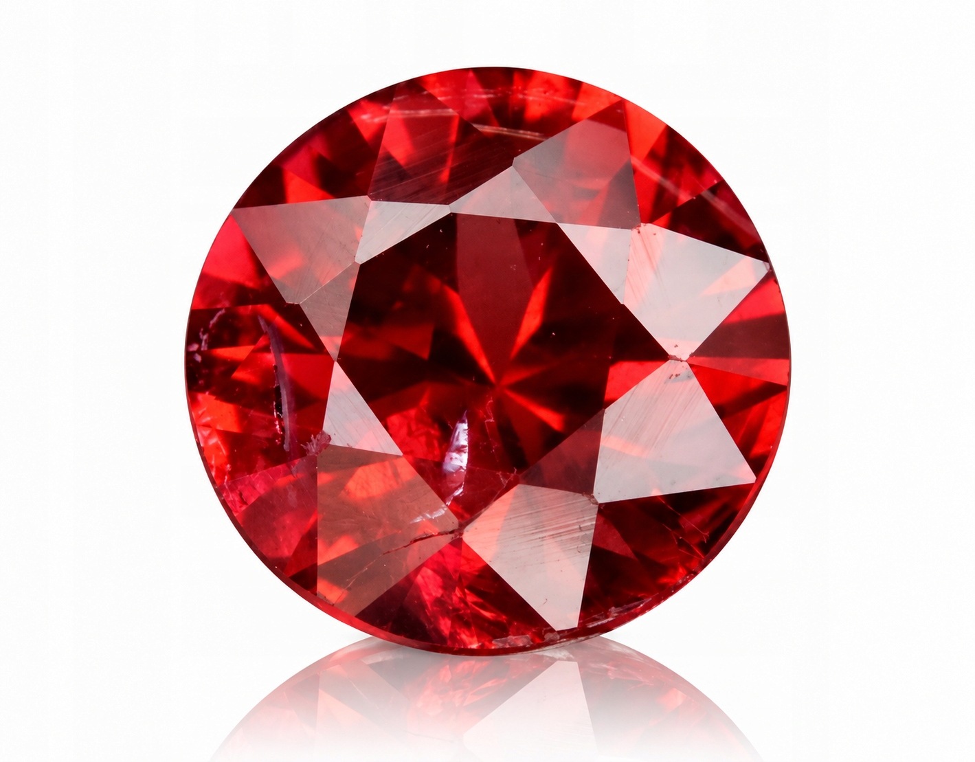Přírodní granát Rodolit 0.95ct Kulatý Mosambik eCertifikát Wbd