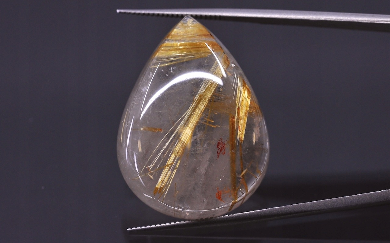 Křemen s rutilem kabošon slza 27x20 mm