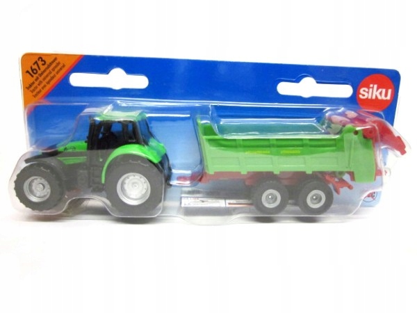 

1673 traktor z rozrzutnikiem obornika siku
