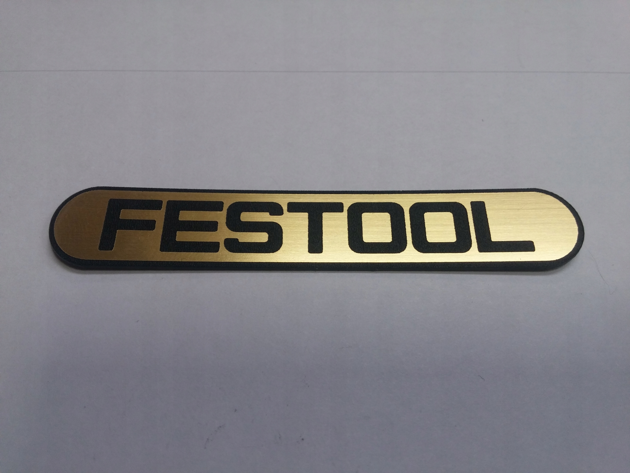 

Festool naklejka emblemat 82 x 15 mm * Złota