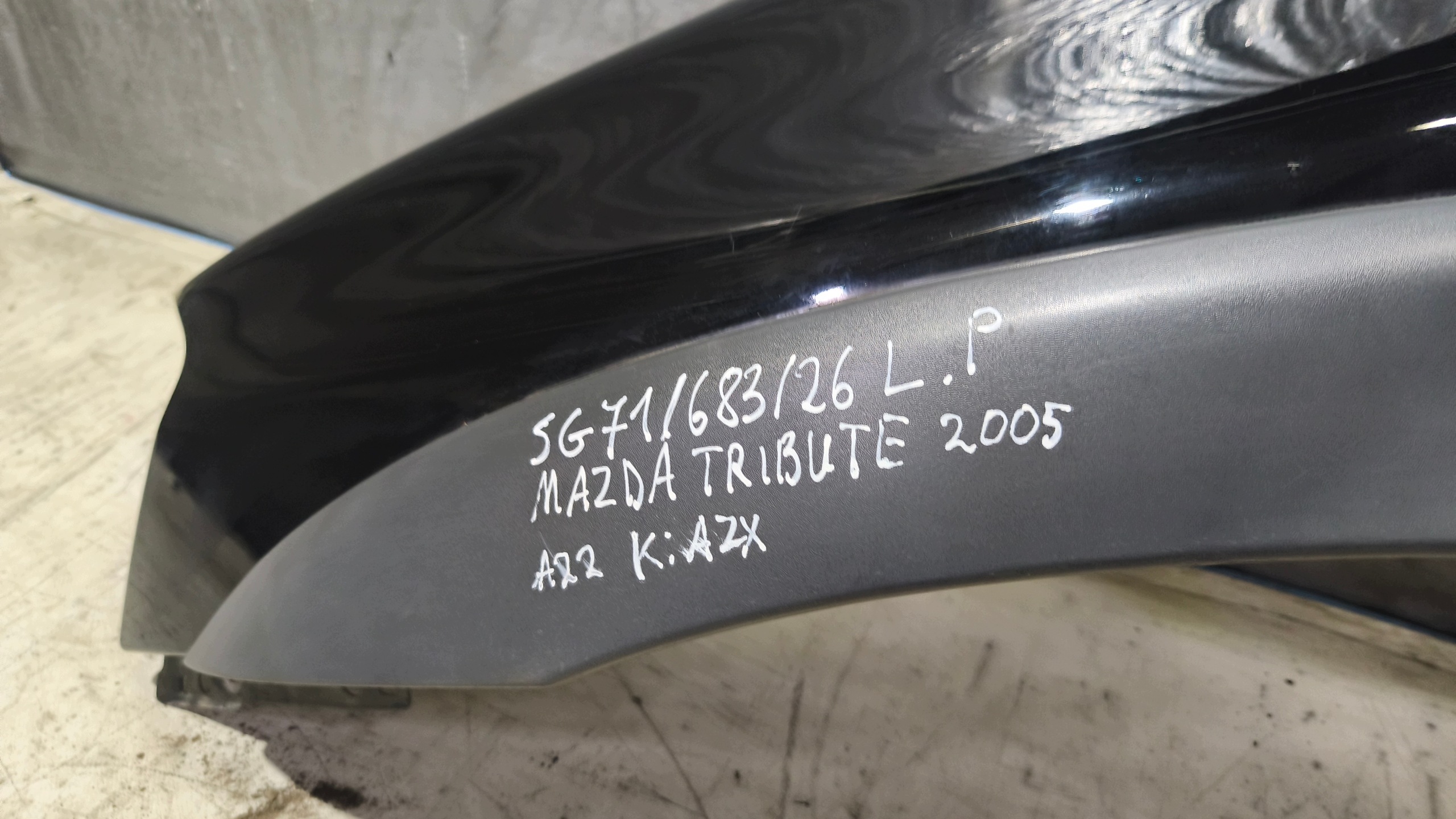 fender left front MAZDA TRIBUTE 2005r K: AZX
