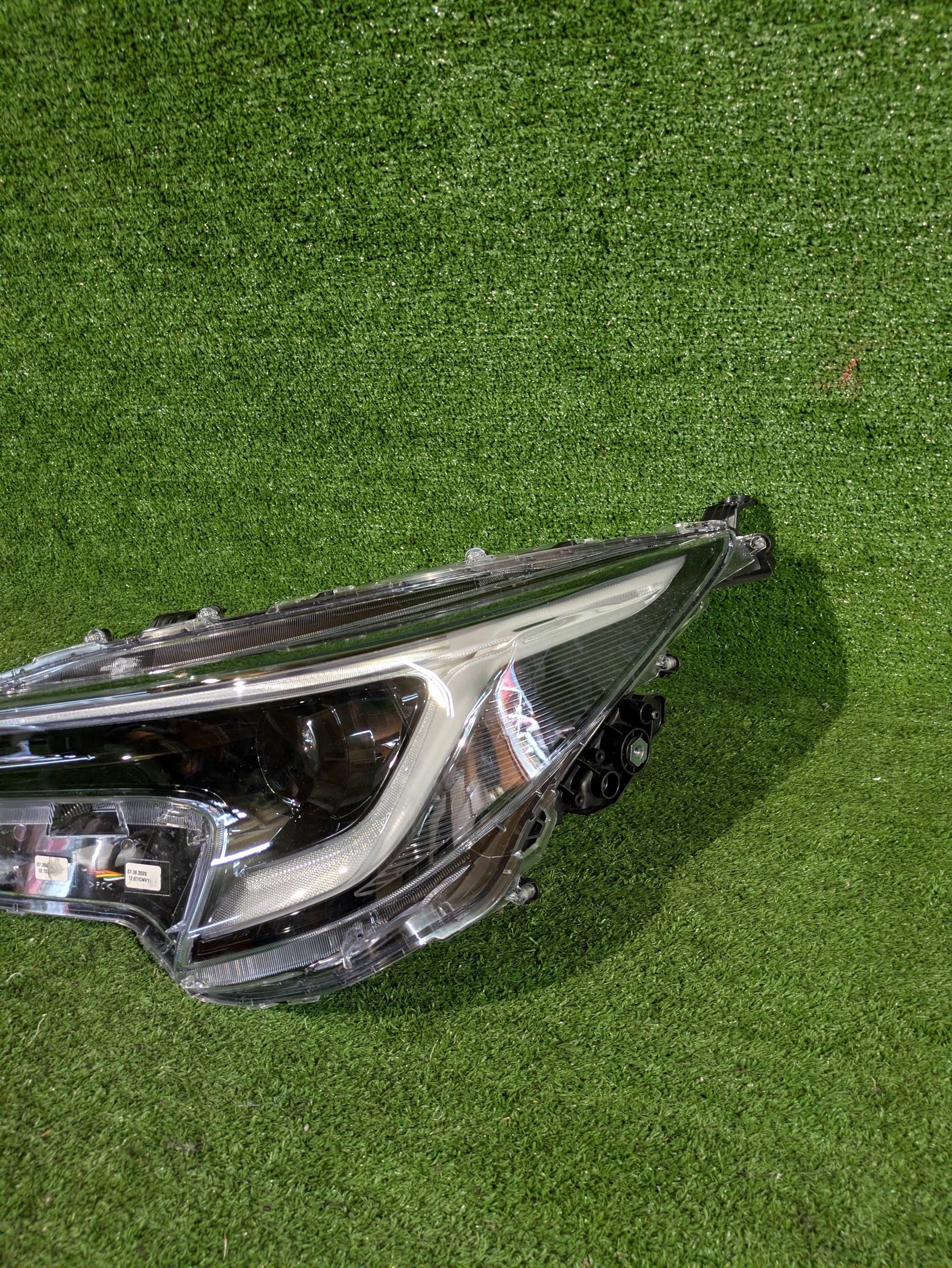 REFLEKTOR left front TOYOTA COROLLA E21 HB KOMBI LIFT NR.1348