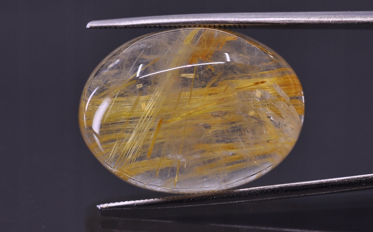 Křemen s rutilem kabošon ovál 23x17 mm