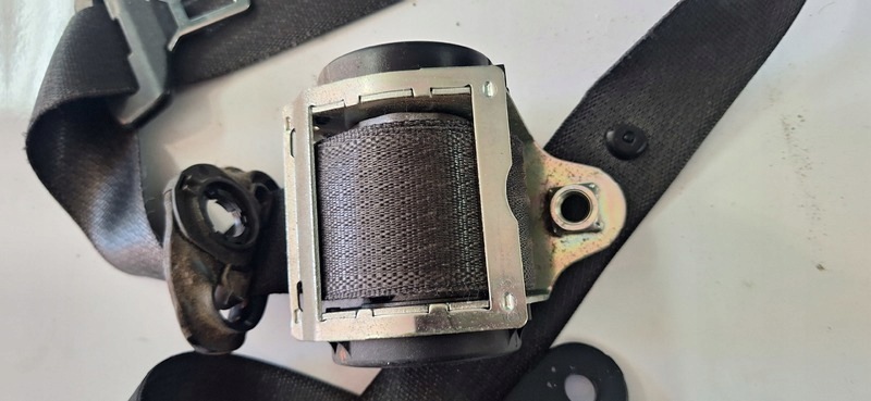 seat belt adjuster left front OPEL CORSA D 607707700D