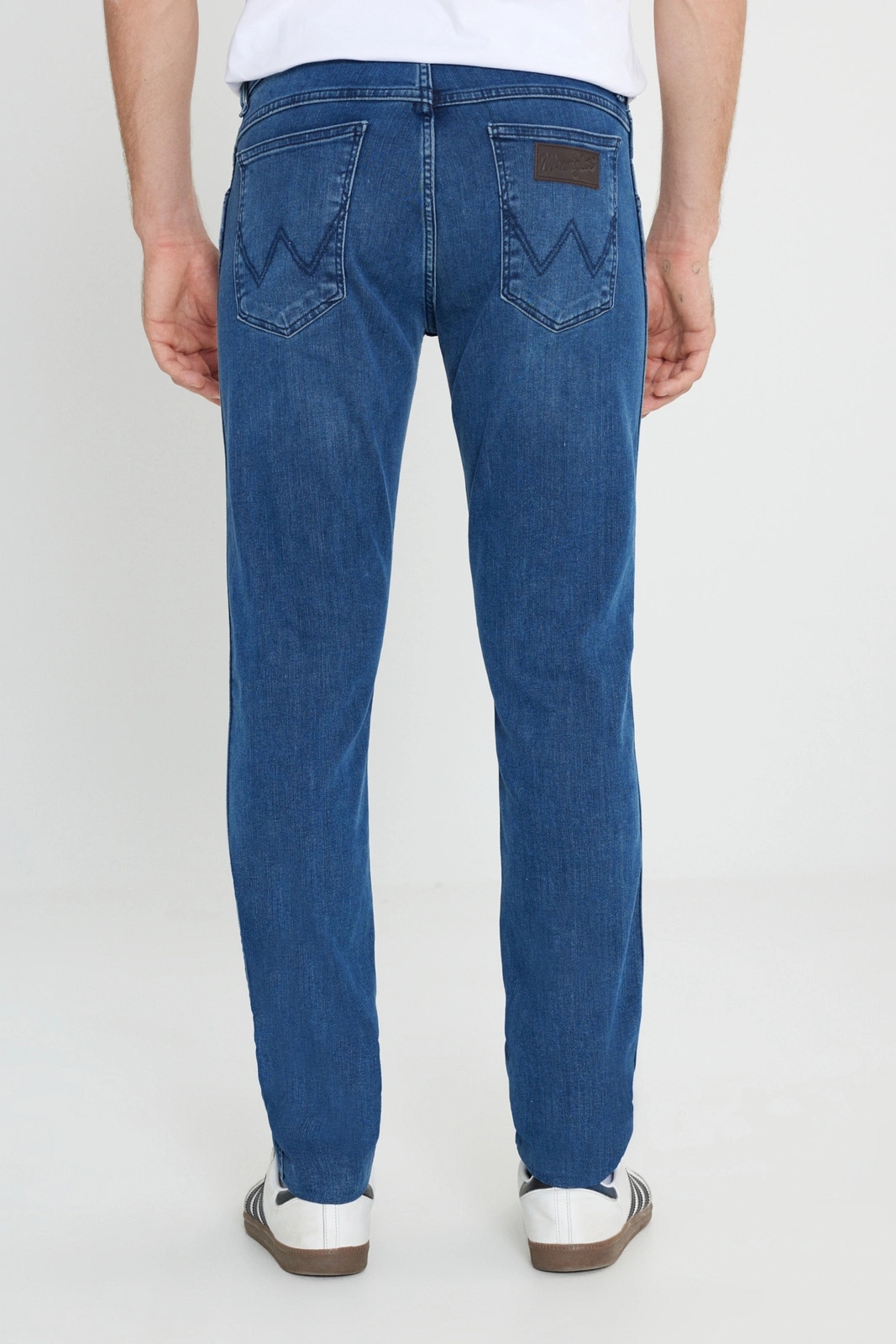 Pánské zúžené džínové kalhoty Wrangler Larston MID Blue 112388612 33/32