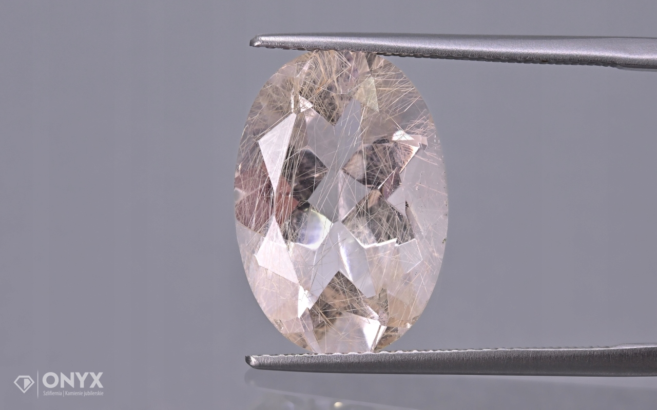 Křemen s rutilem fazetovaný ovál 17x11,5 mm