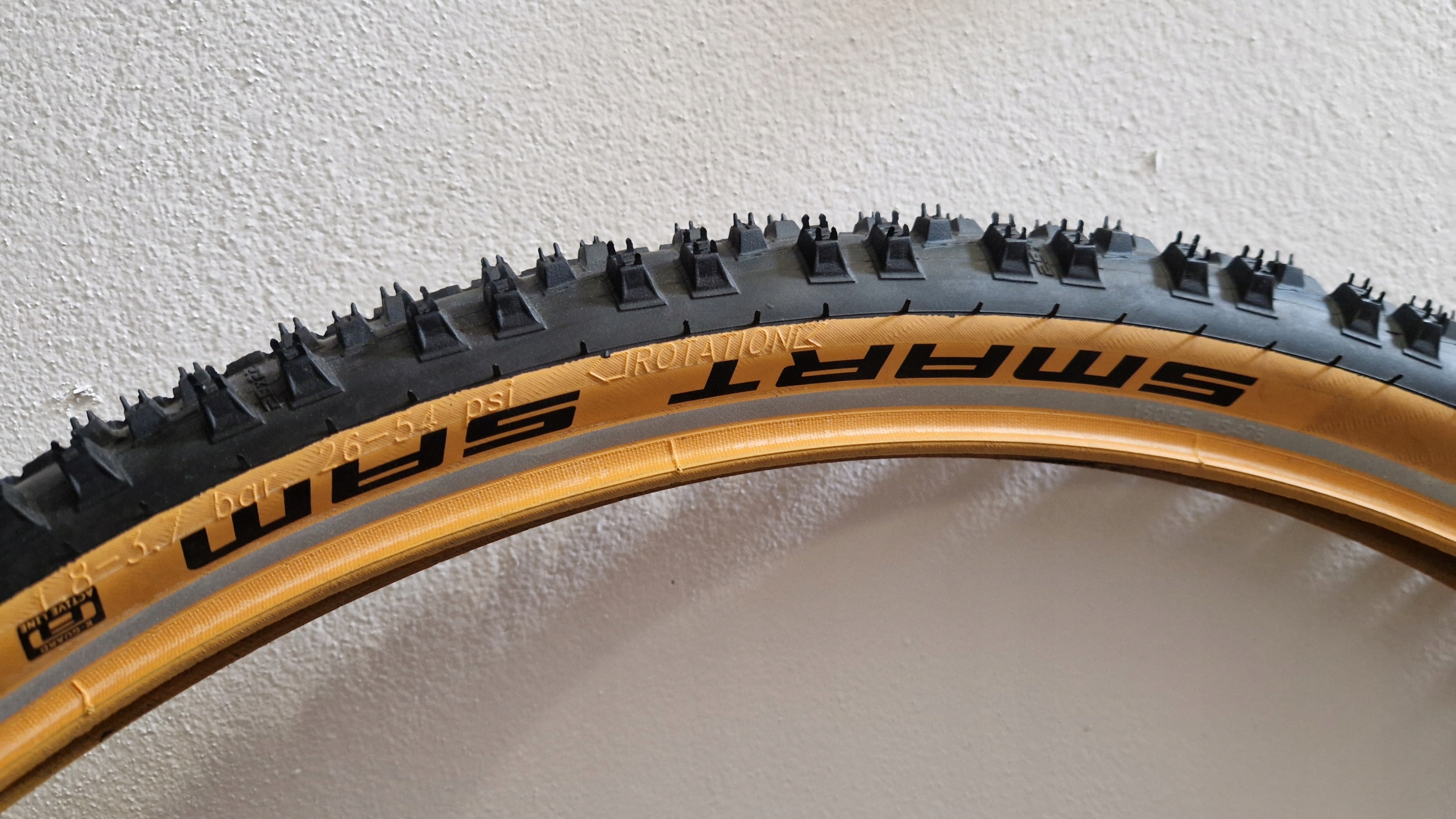 Opona Mtb Schwalbe Smart Sam brązowy 29x2,25" drut reflex pasek