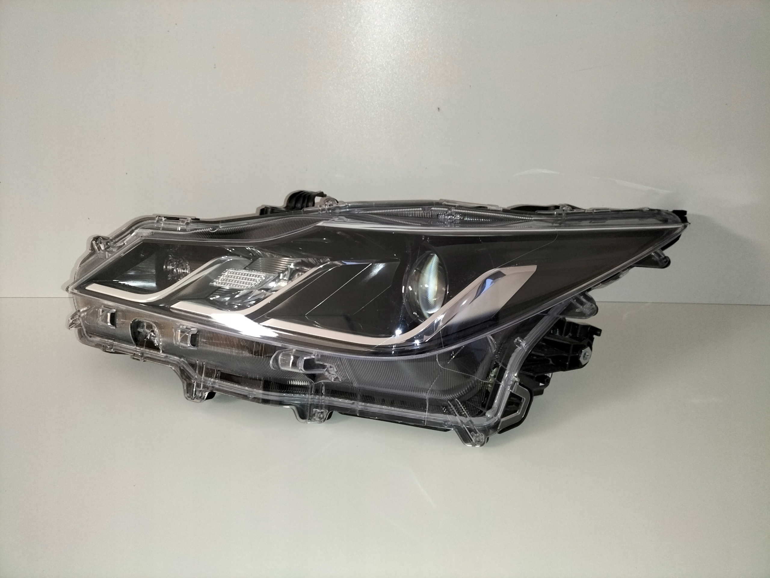 light front reflektor left TOYOTA COROLLA E21 18-22 sedan