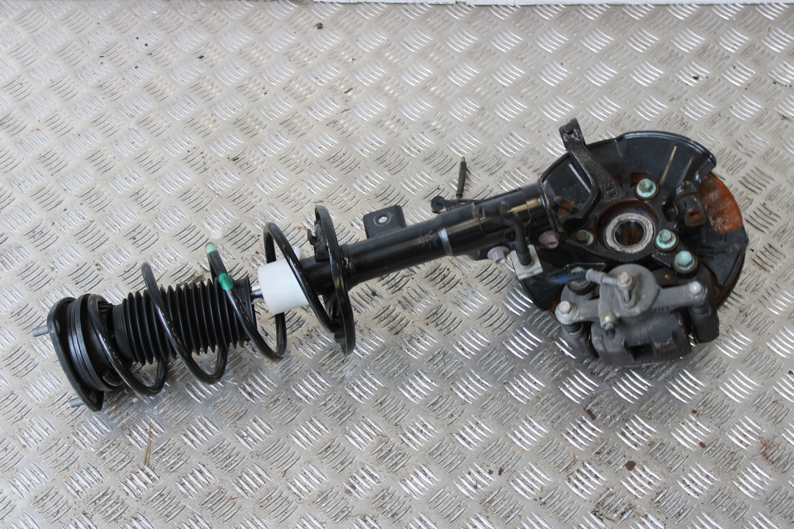 swing shock absorber right front MAZDA 2 II DJ LIFT