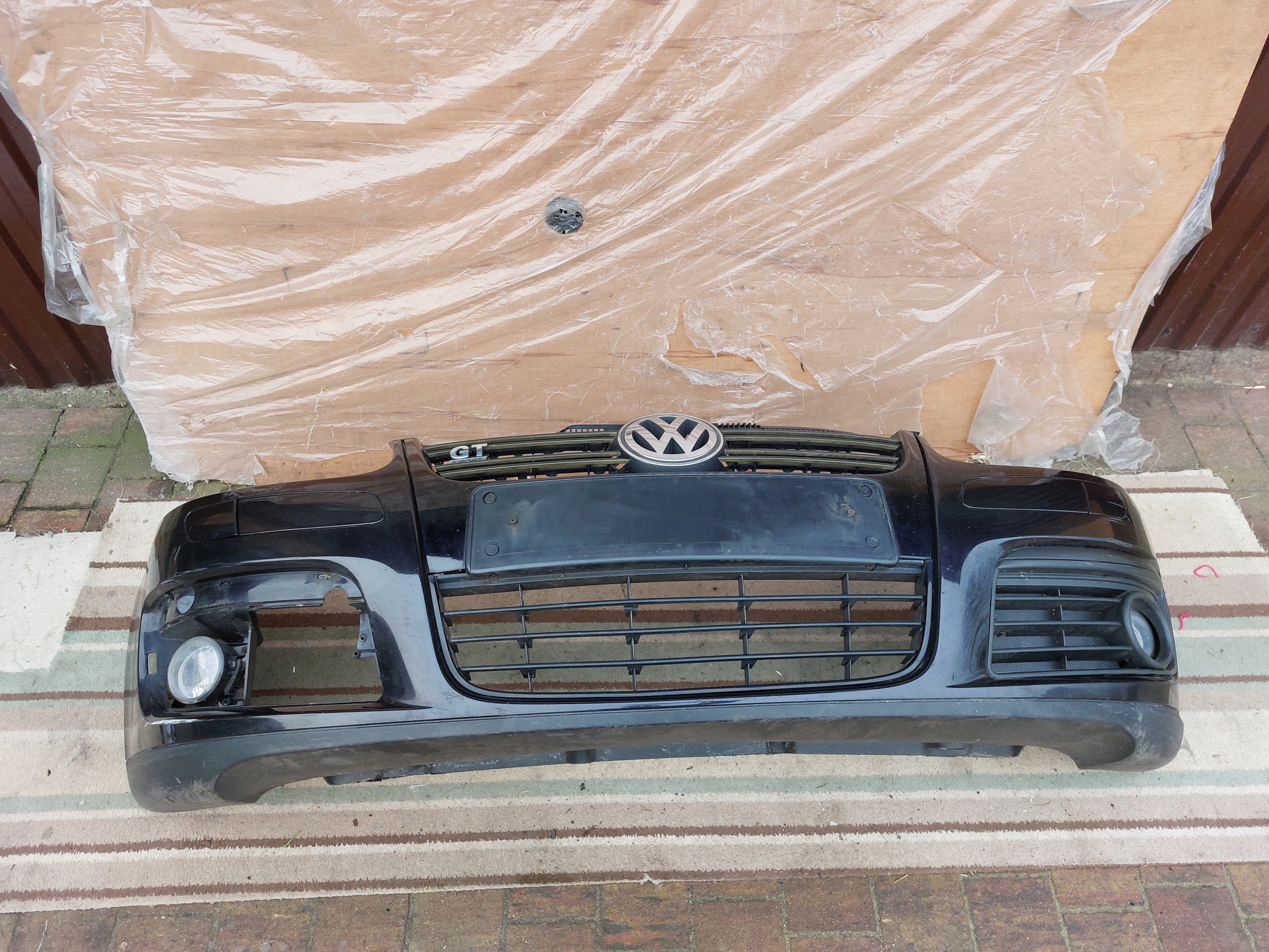 bumper front front VW GOLF V 5 GTI black washers