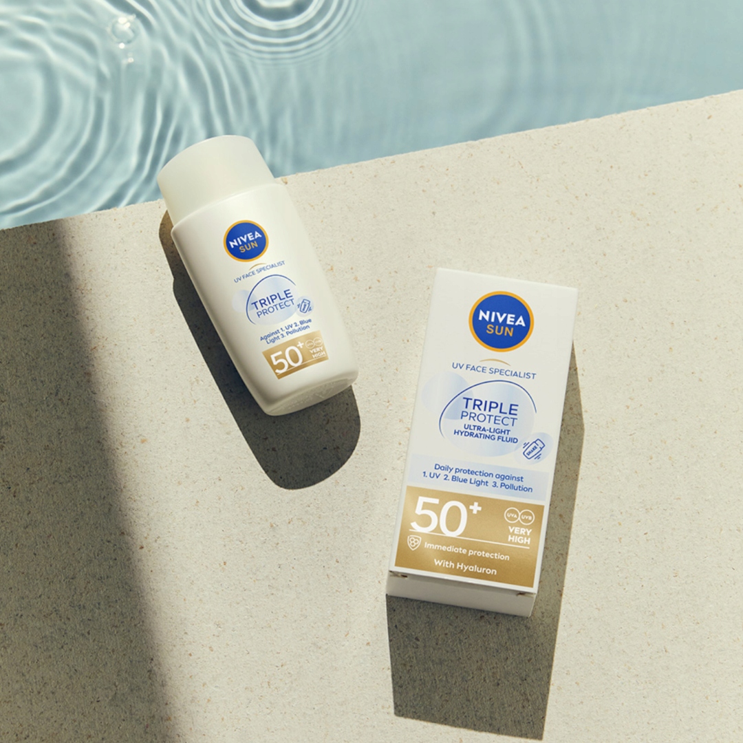 NIVEA SUN TRIPPLE PROTECT ULTRALEKKI FLUID DO TWARZY Z FILTREM SPF50+ 40 ML Marka Nivea