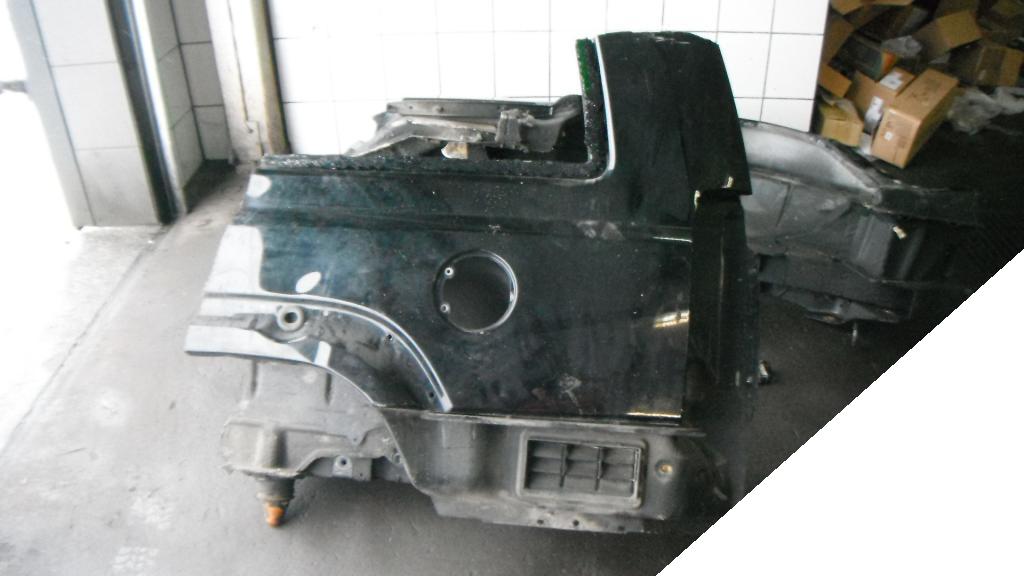 JEEP COMMANDER XH 05- 2005- BŁOTNIK LEWY TYLNY