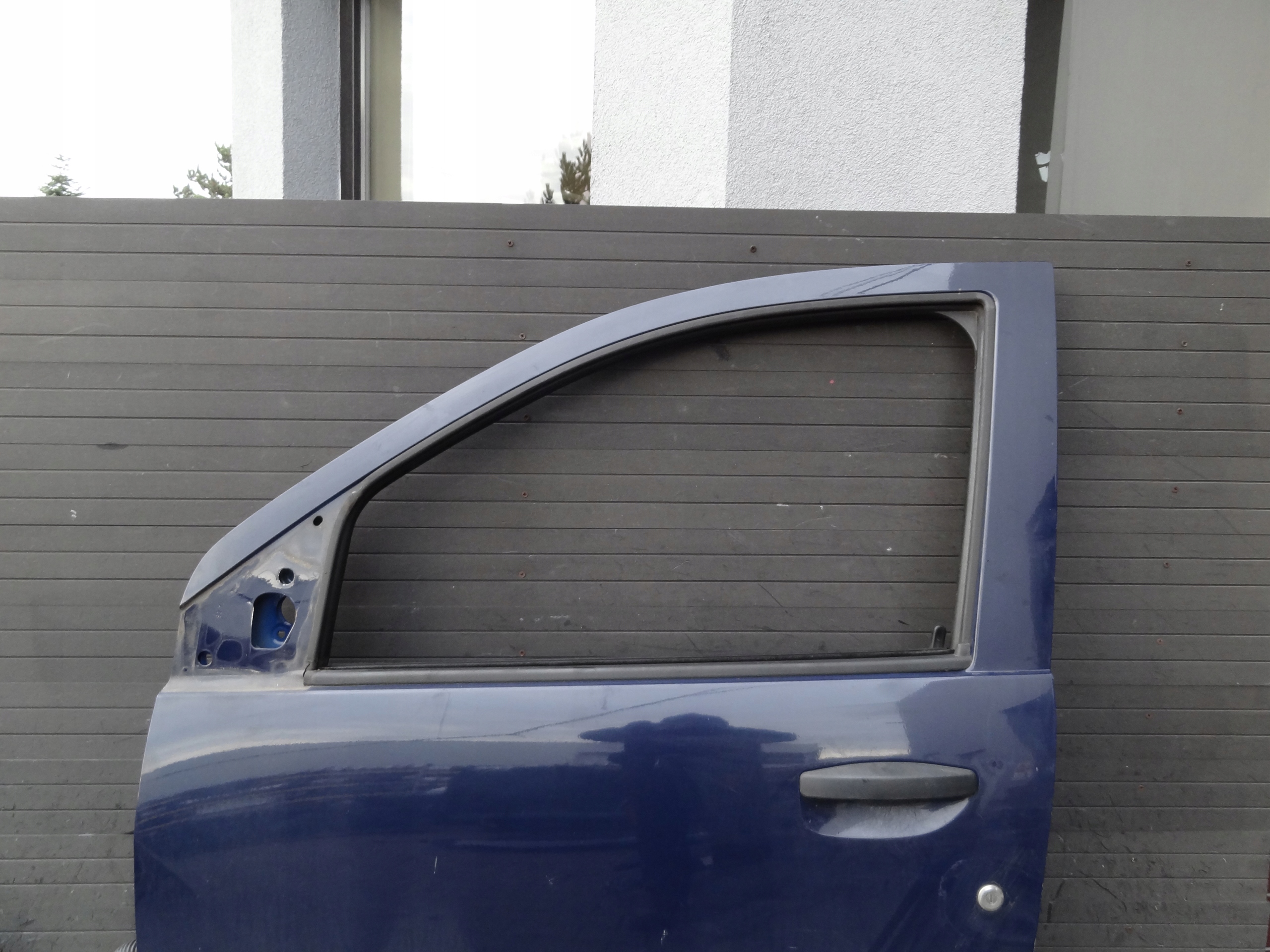 DACIA DOKKER 2013 DRZWI PRZEDNIE LEWE KOMPLETNE ORYGINAL Producent części Dacia OE