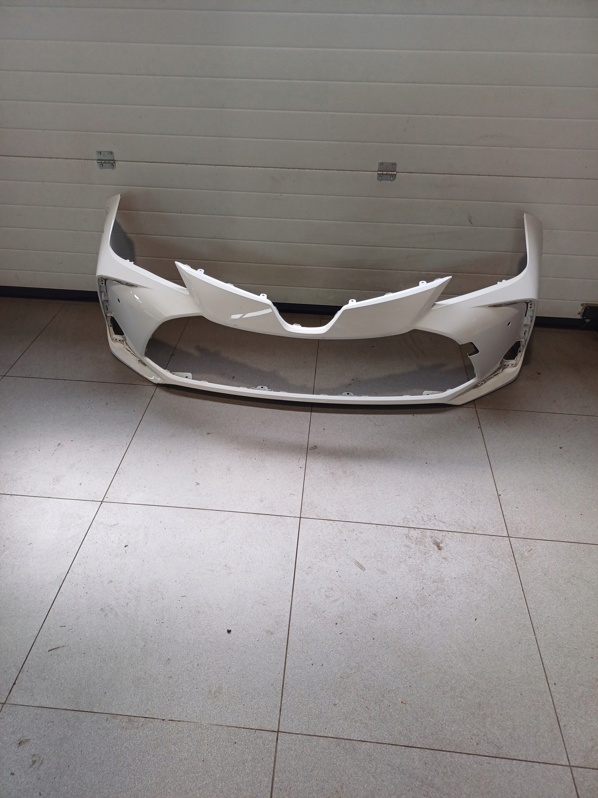 bumper front front TOYOTA COROLLA E21 2 X PDC 52119-02Q10