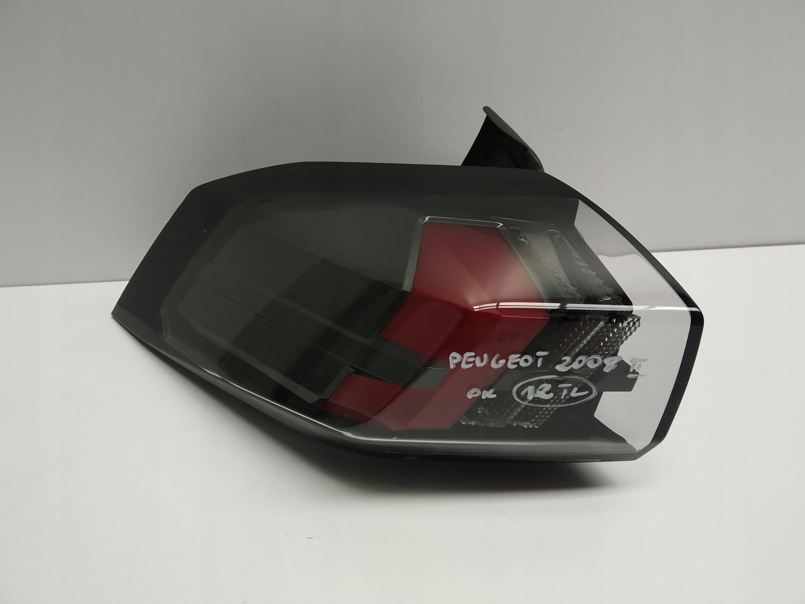 19+ Peugeot 2008 II light rear part left original