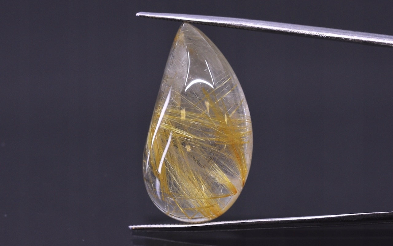 Křemen s rutilem kabošon nepravidelný 26x14 mm