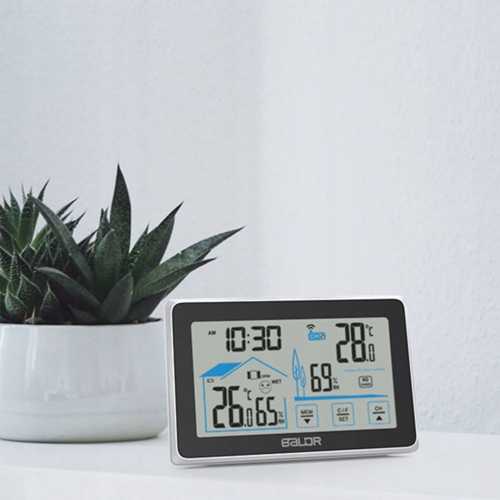 BEZPRZEWODOWA STACJA POGODOWA HIGROMETR ZEGAR Z WYŚWIETLACZEM + CZUJNIK Funkcje budzik pamięć pomiarów maksymalnych i minimalnych pomiar ciśnienia pomiar temperatury wewnętrznej pomiar wilgotności zegar