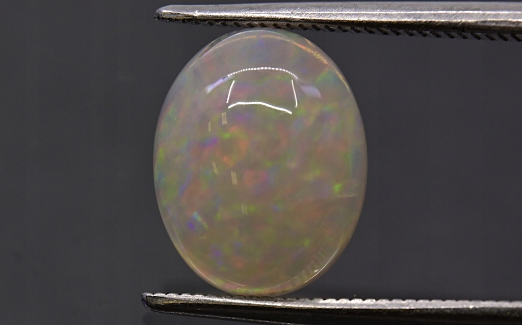 Opál z Etiopie kabošon ovál 10x8 mm