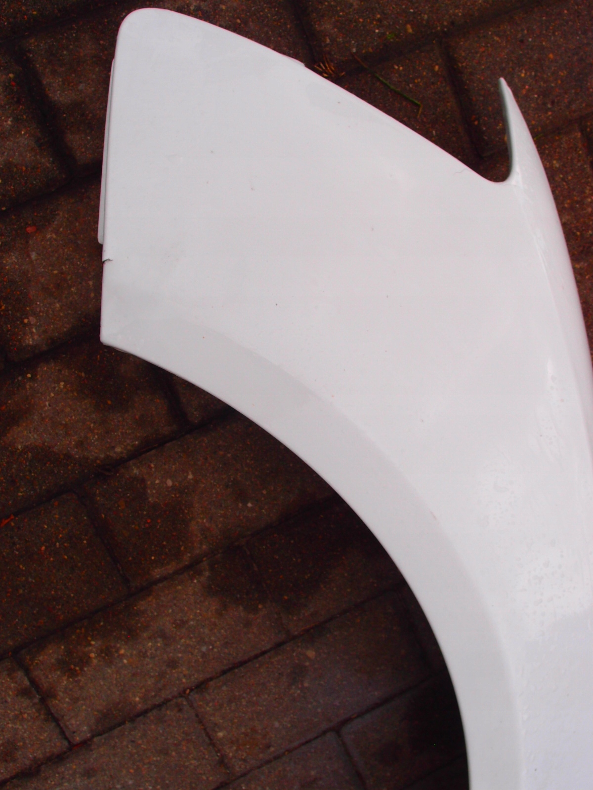 BŁOTNIK LEWY PRZÓD AUDI A5 2013r Strona zabudowy przód - lewa