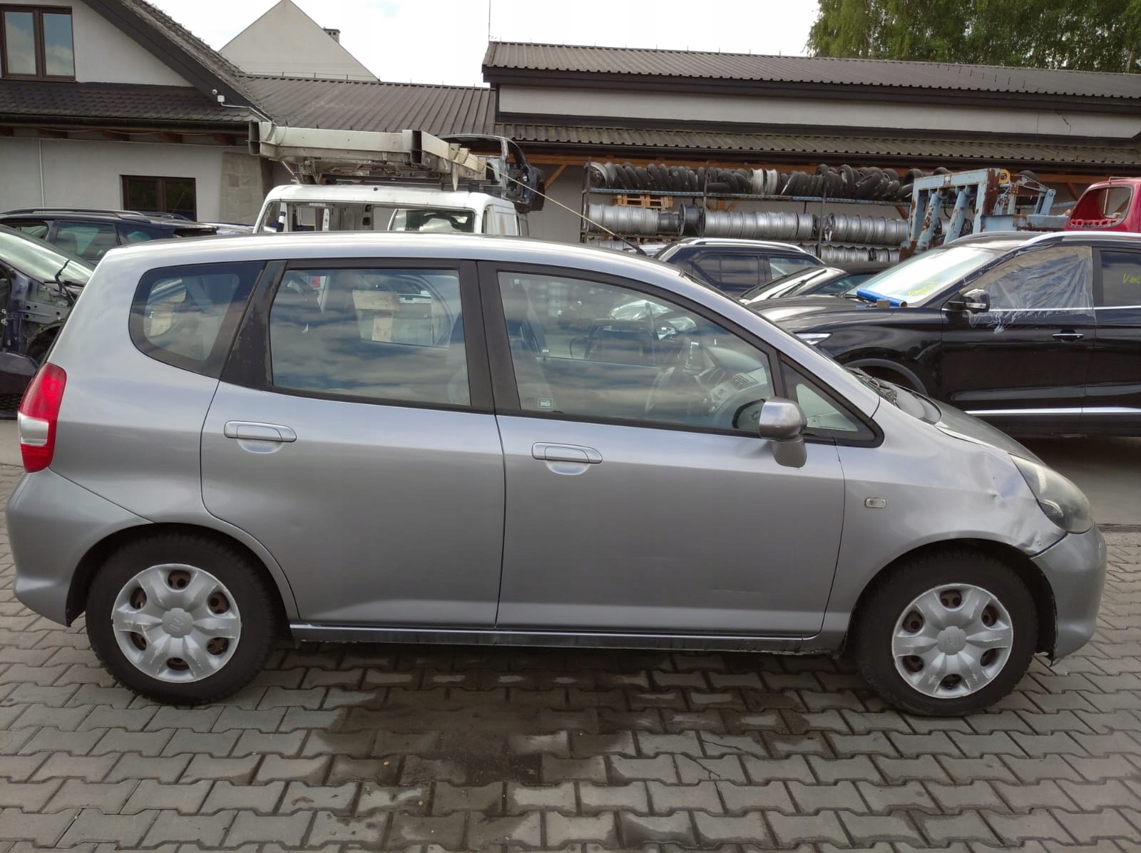 Honda Jazz 2 II GE2 02- door right front front NH642M
