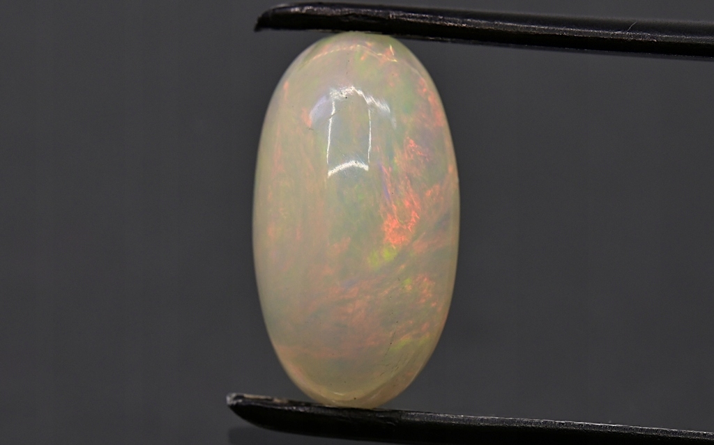 Opál z Etiopie kabošon ovál 15,1x8,1 mm