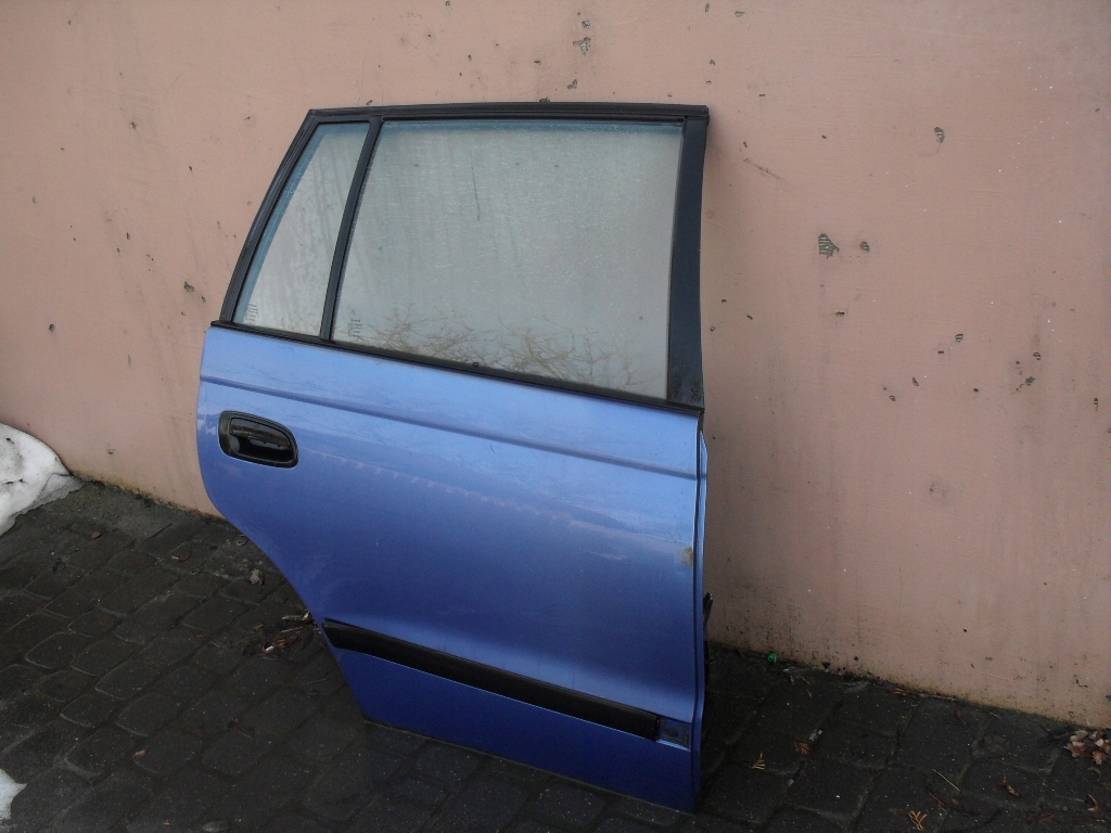 DRZWI LEWE PRAWE TYŁ TOYOTA CARINA E KOMBI 1996r Producent części Toyota OE