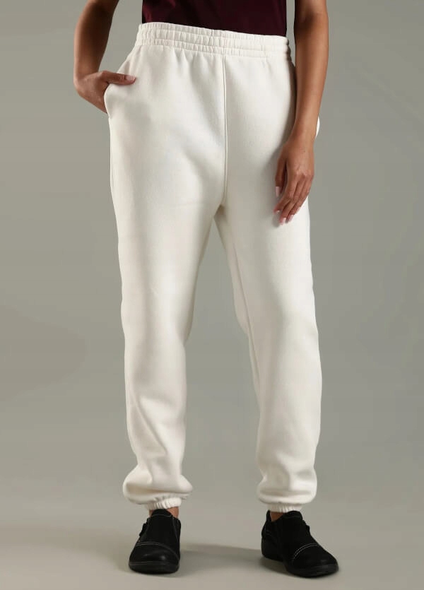 Tommy Hilfiger dámské jogger kalhoty krémové, velikost L