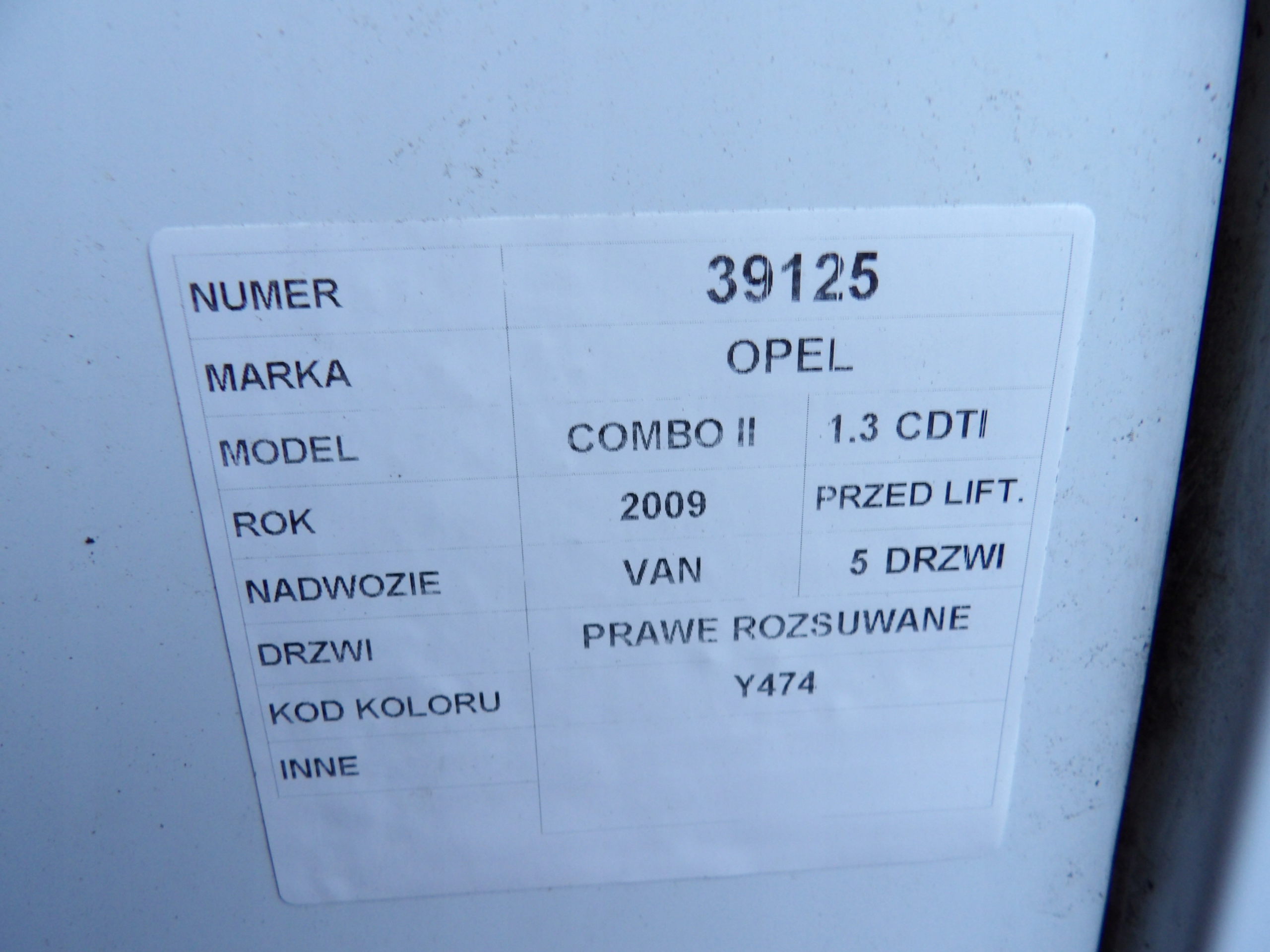 Opel Combo C II sliding right lak. Y474