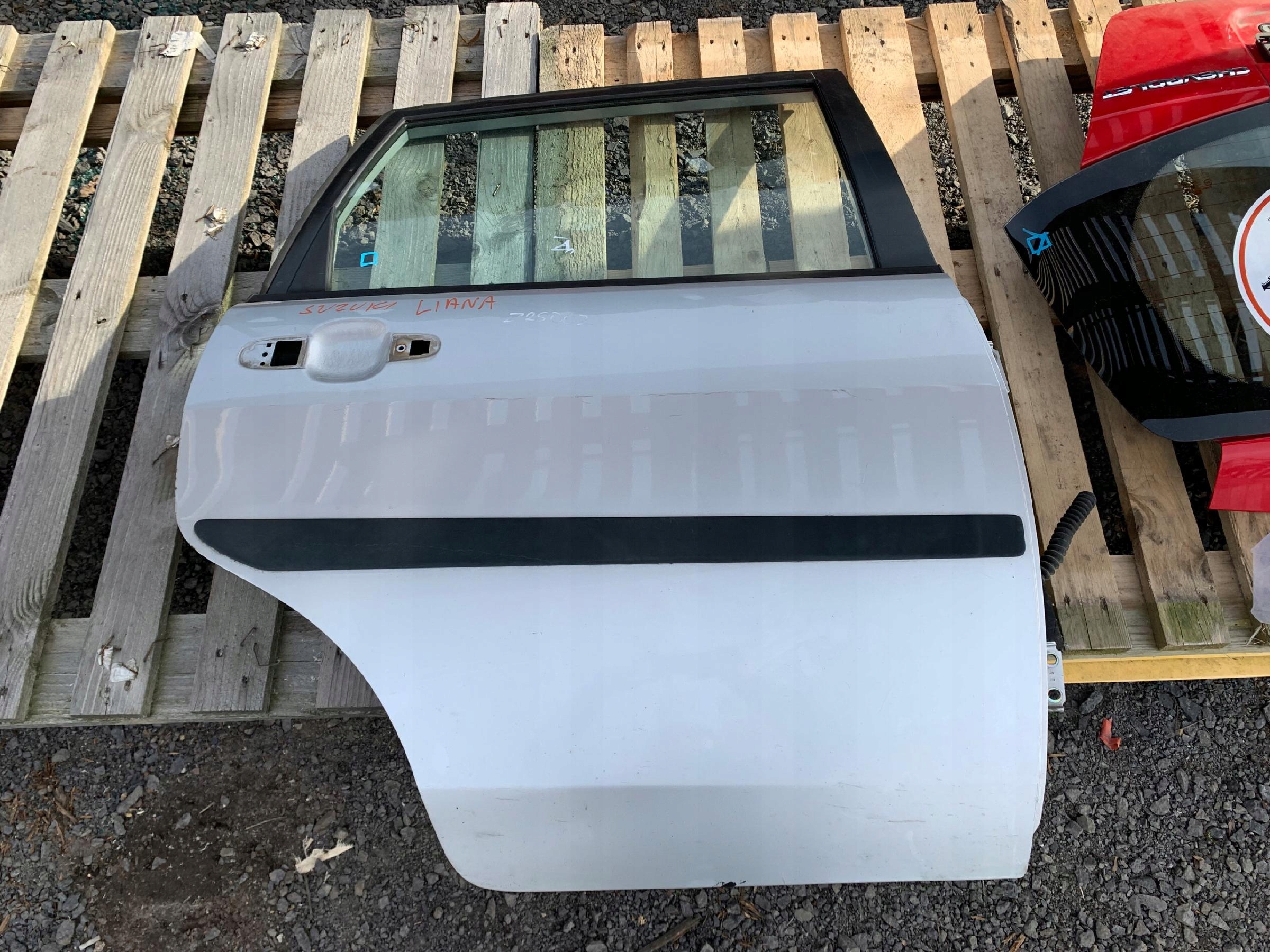 SUZUKI LIANA door left rear part silver Z2S