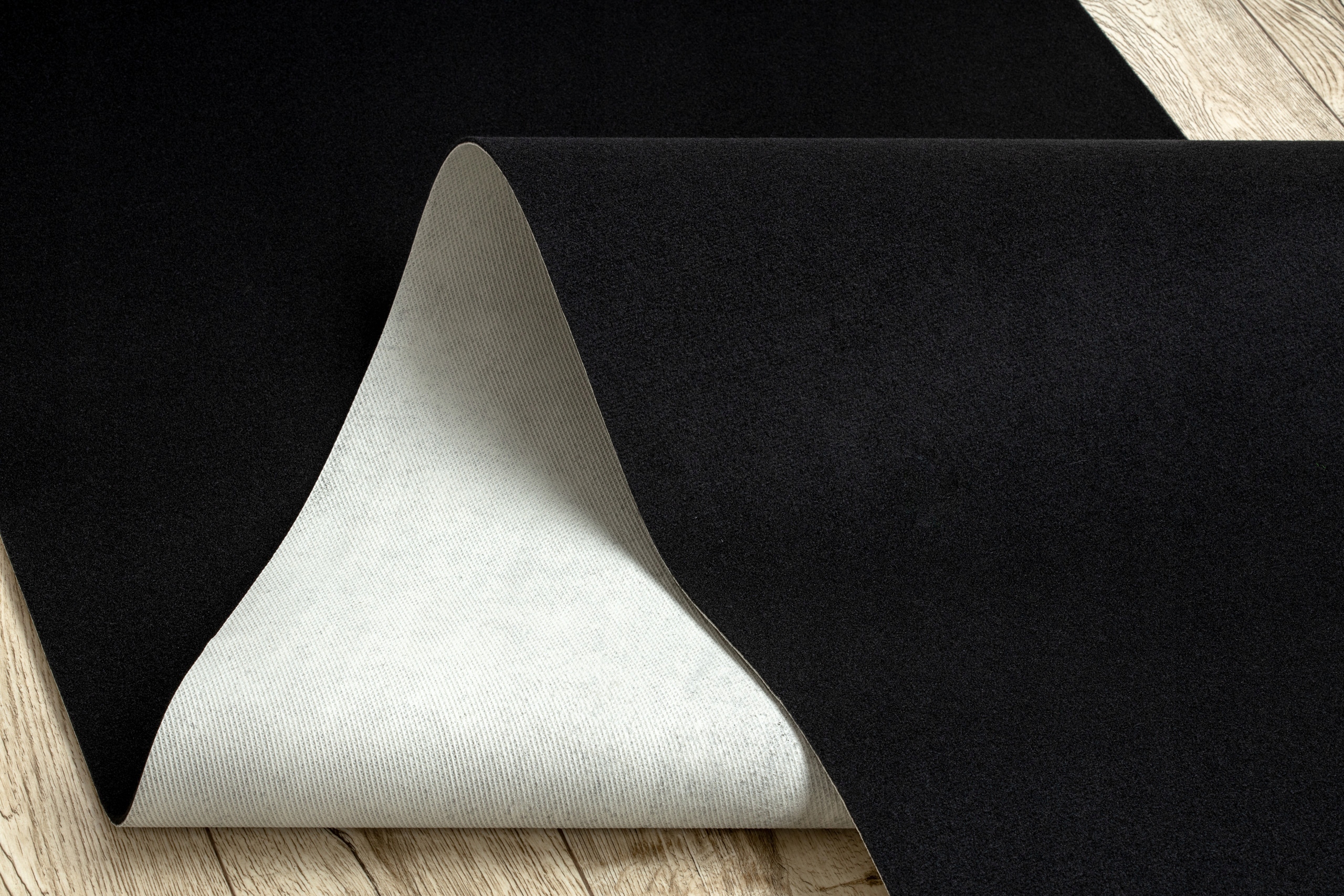 ANTYPOŚLIZGOWY DYWAN GŁADKI JEDNOLITY RUMBA 80x100 cm czarny @160602 Materiał wykonania poliamid