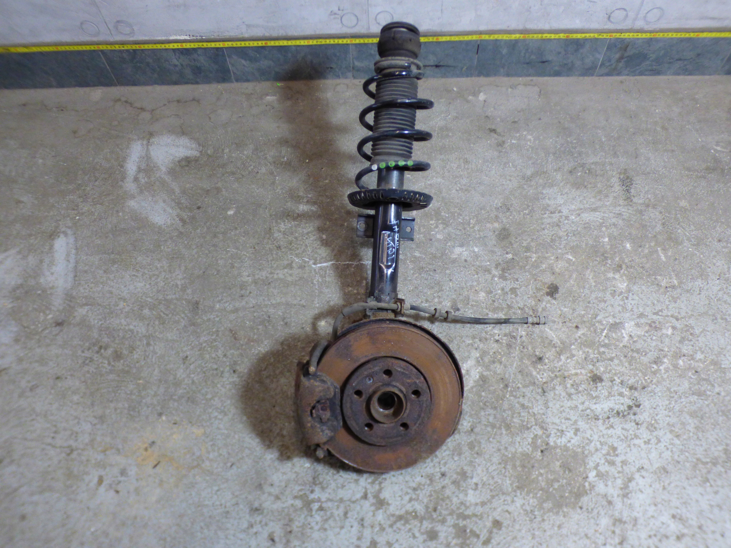 McPherson swing shock absorber left SKODA FABIA III 1.4TDI