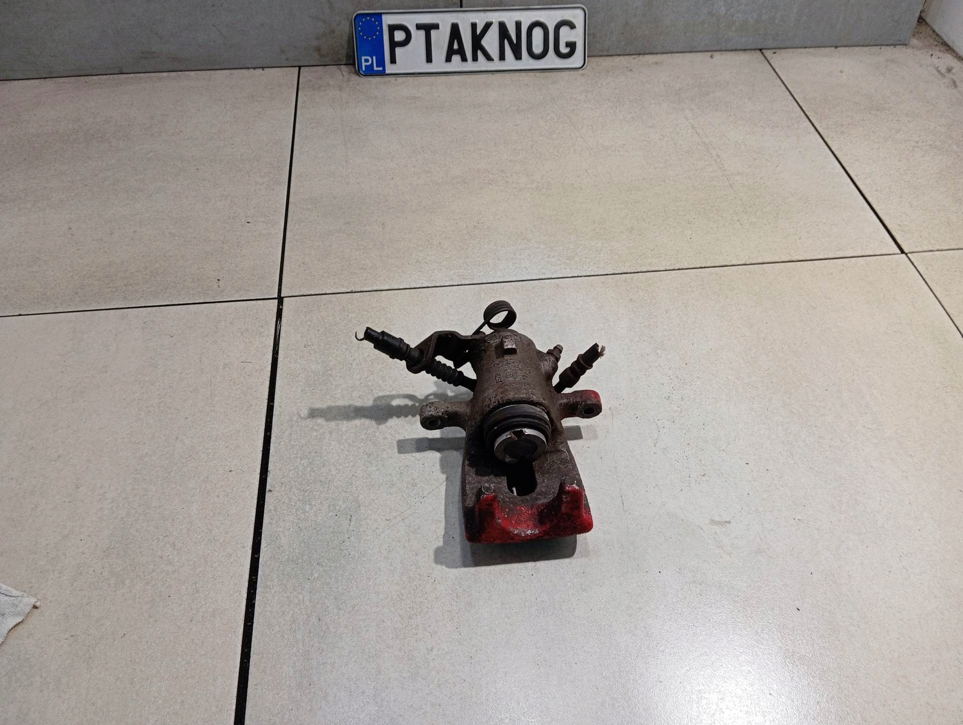 caliper OPEL left rear part ASTRA H 1.6