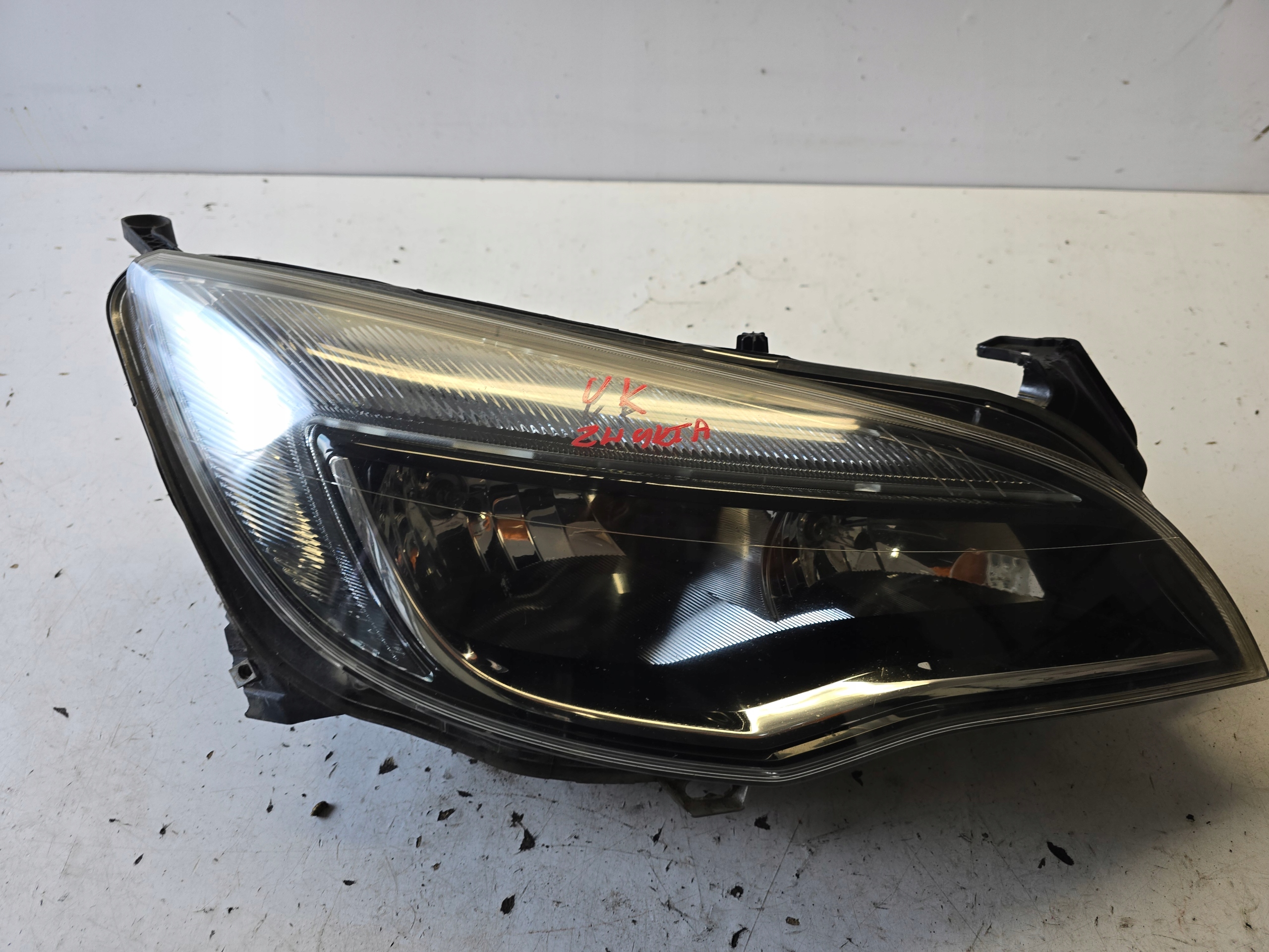OPEL ASTRA J 4 LIFT REFLEKTOR light right front right CIEMNA ANGLIK UK