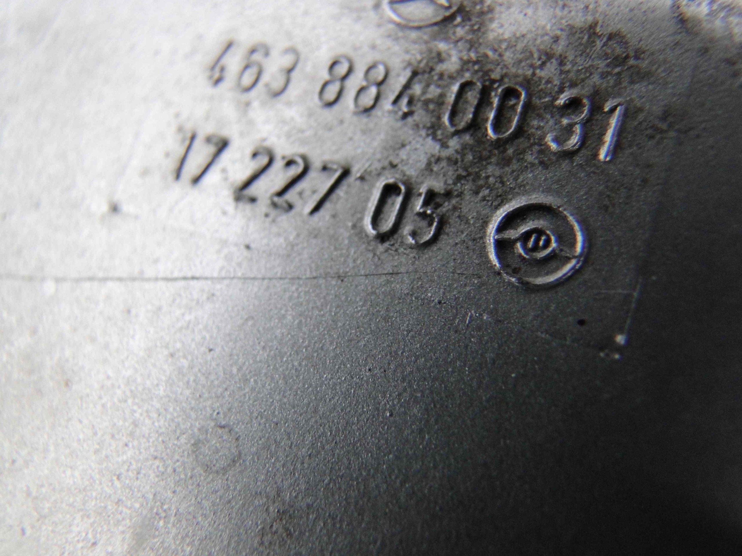 MERCEDES G KLASA W463 463 OSLONA NA LAMPE LEWA Part number A4638840031