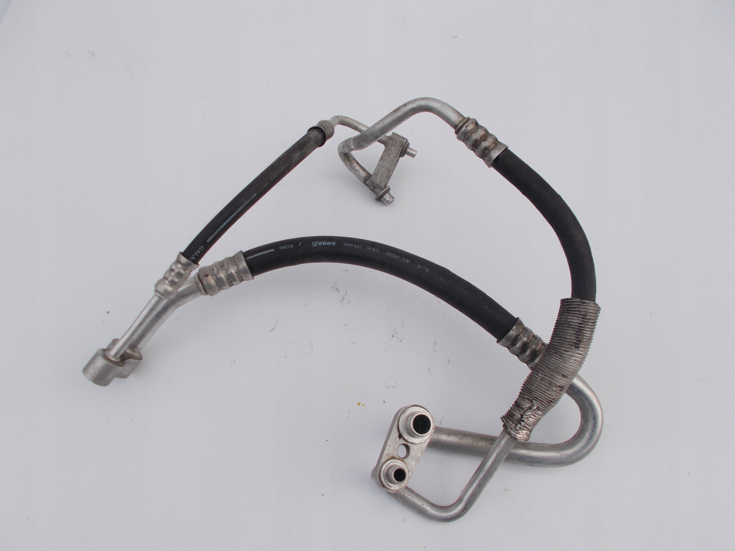 Шланг кондиціонера Opel Corsa D 1.4 бензиновий