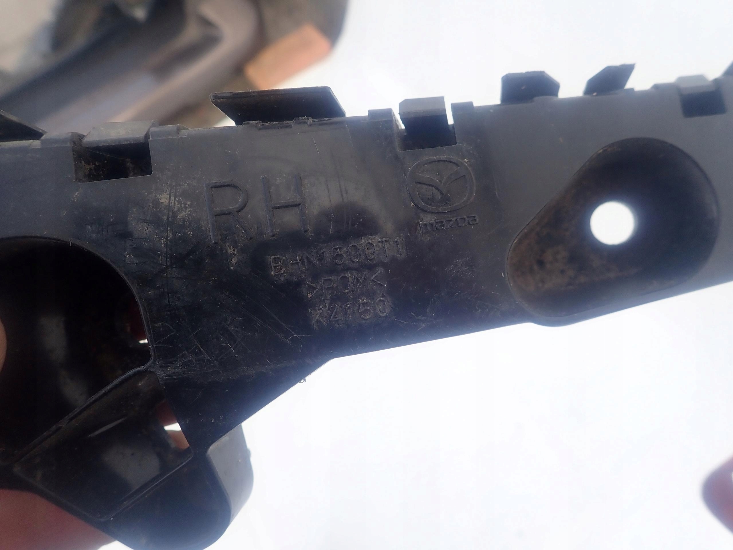 MAZDA 3 13- bumper bracket right front BHN1500T1
