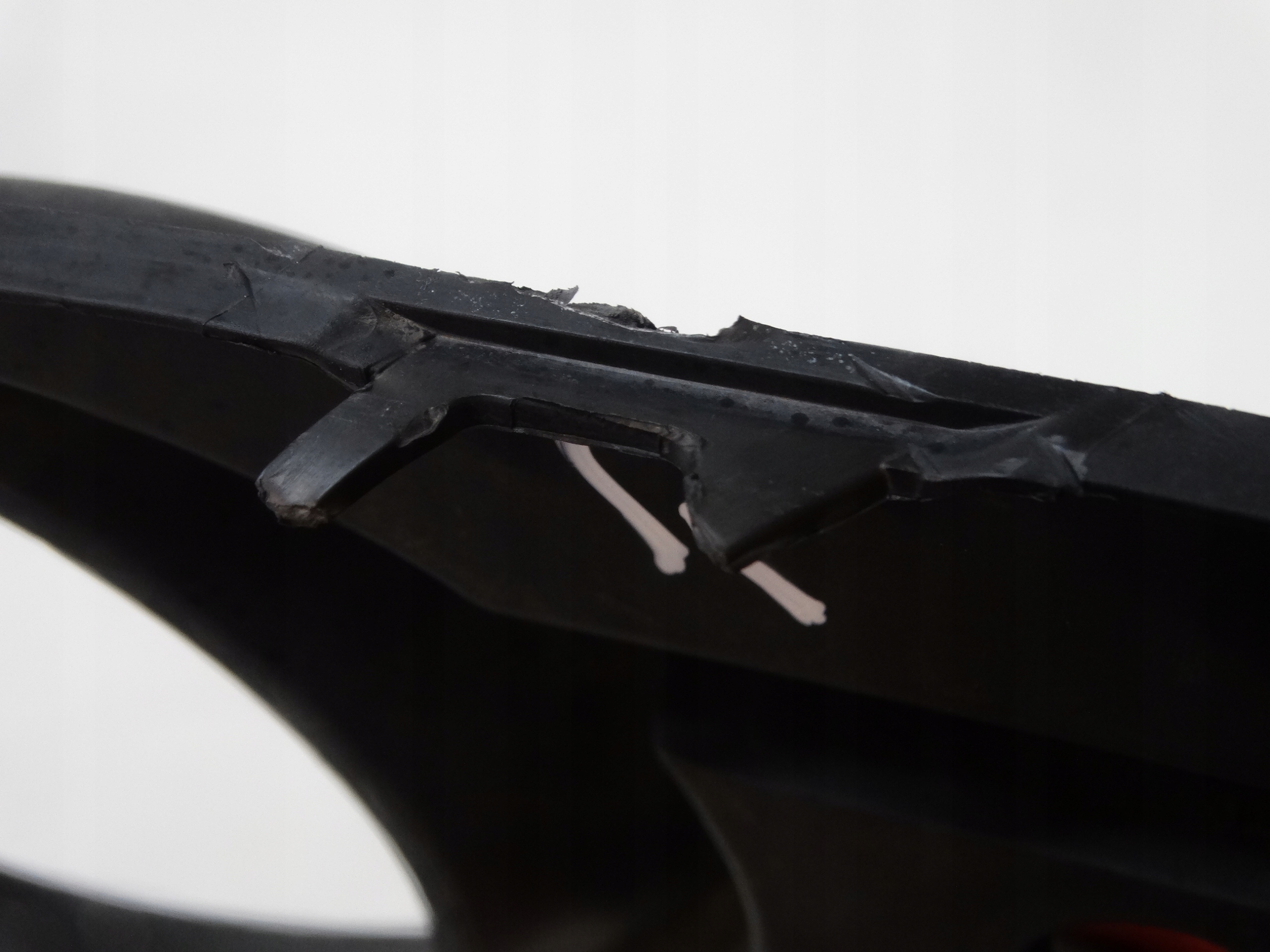 grid of a bumper left front OPEL CORSA D 13211478
