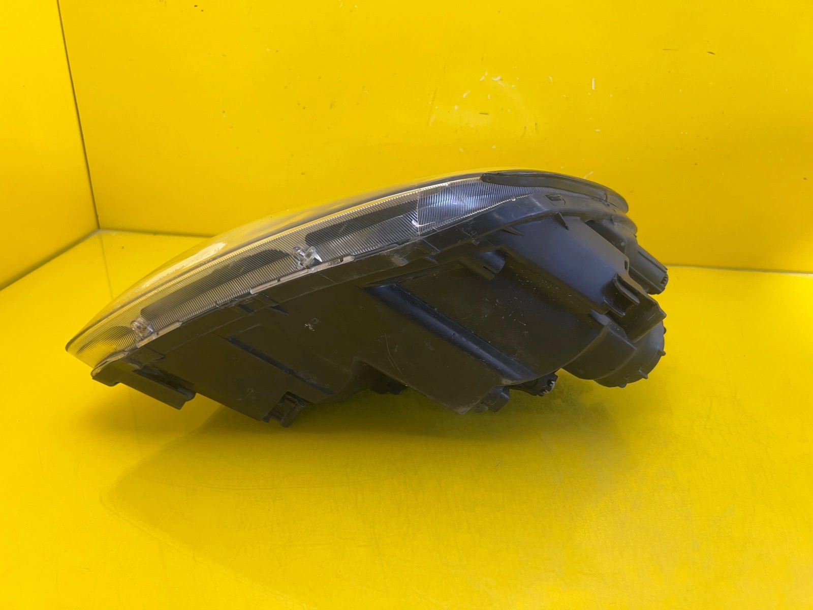 light left front Kia Carens III 921011D0L 2008