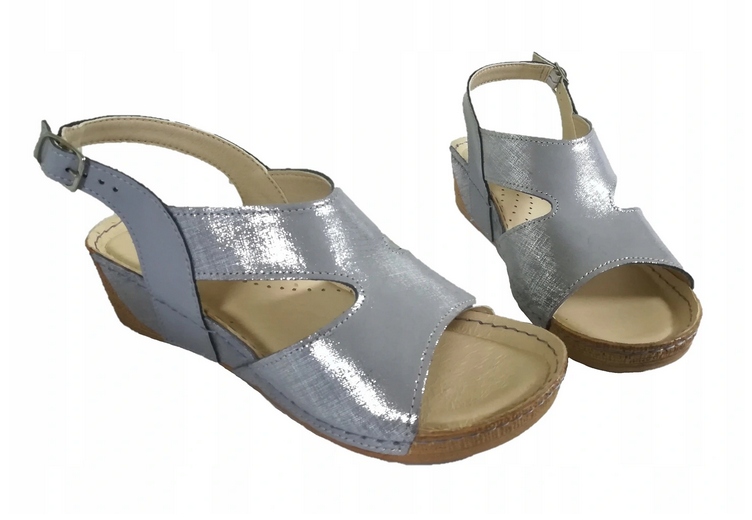 

64. Uniwersał obszywane sandały na koturnie s.nat.